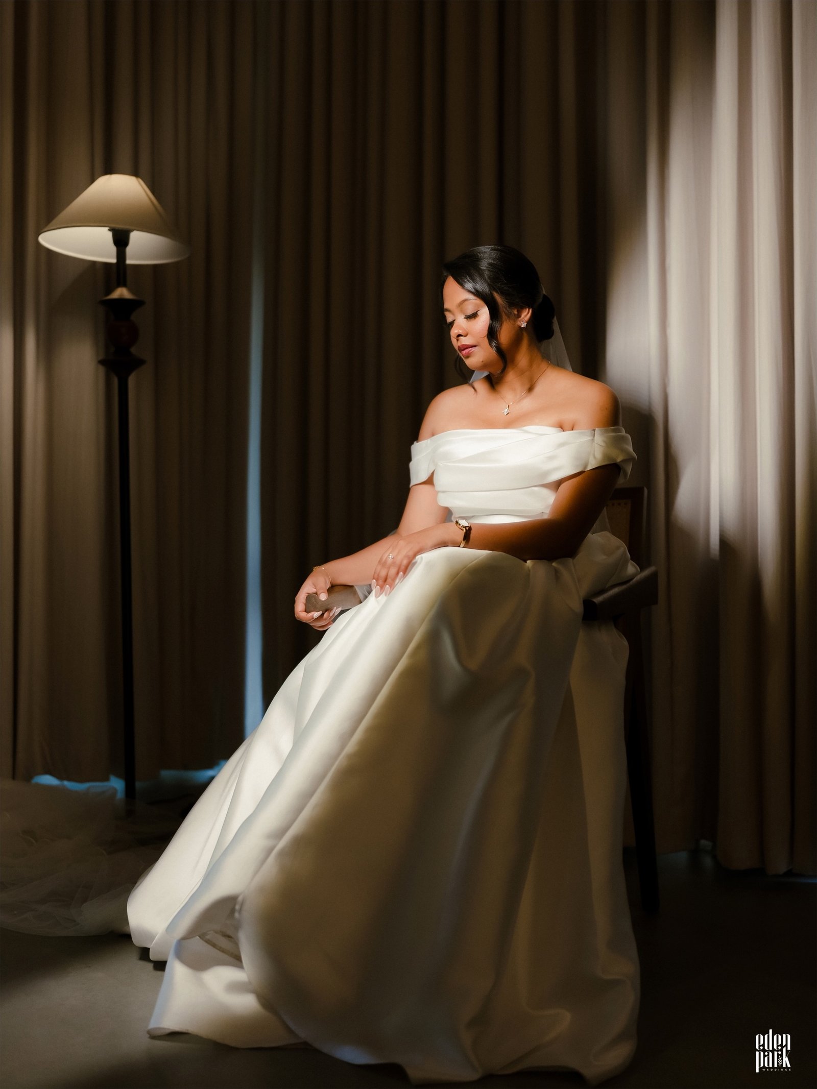A bride in a quiet, softly lit moment