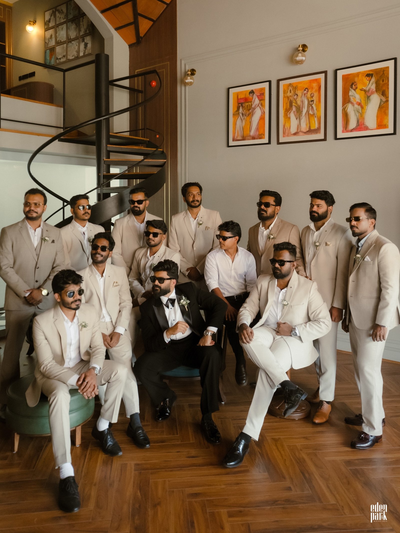 A wedding party gathered together indoors